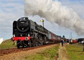 Mid Norfolk steam railway line running adjacent to the park